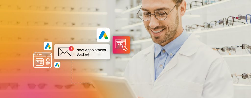 Smiling white male optician using digital tablet in optical store with eyeglasses on shelves